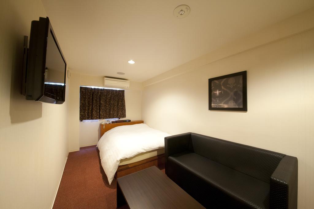 Hotel The G Osaka Quarto foto